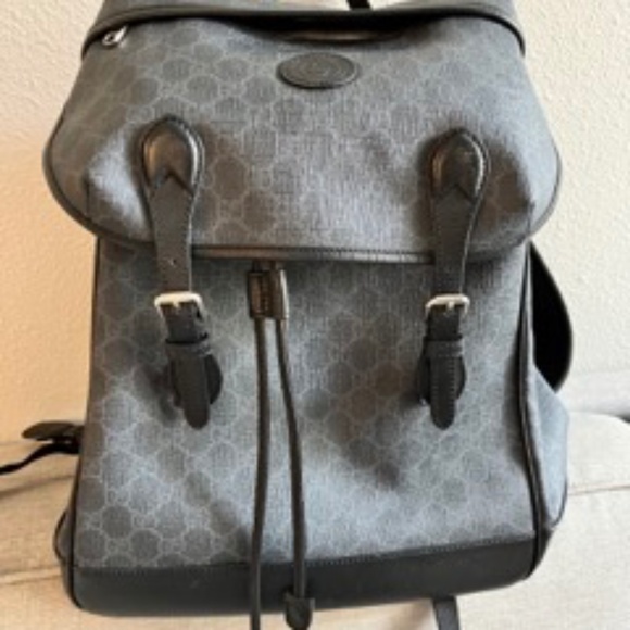 Gucci MEDIUM BACKPACK WITH INTERLOCKING G